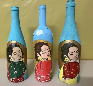 Shy ladies recycled bottle art