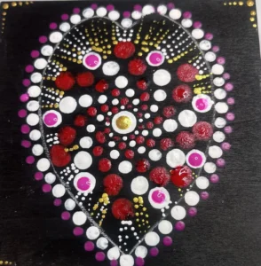 Heart shaped dotted mandala coaster